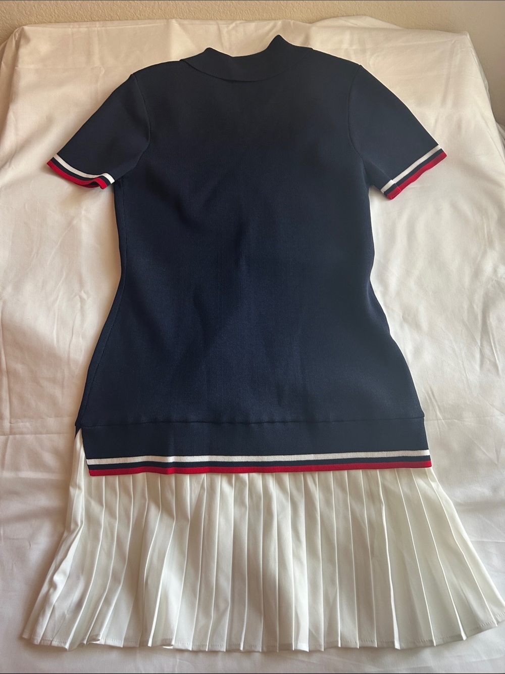 English Factory Navy Polo Knit Dress with White Pleated Hem and Red Trim - Picture 5 of 5